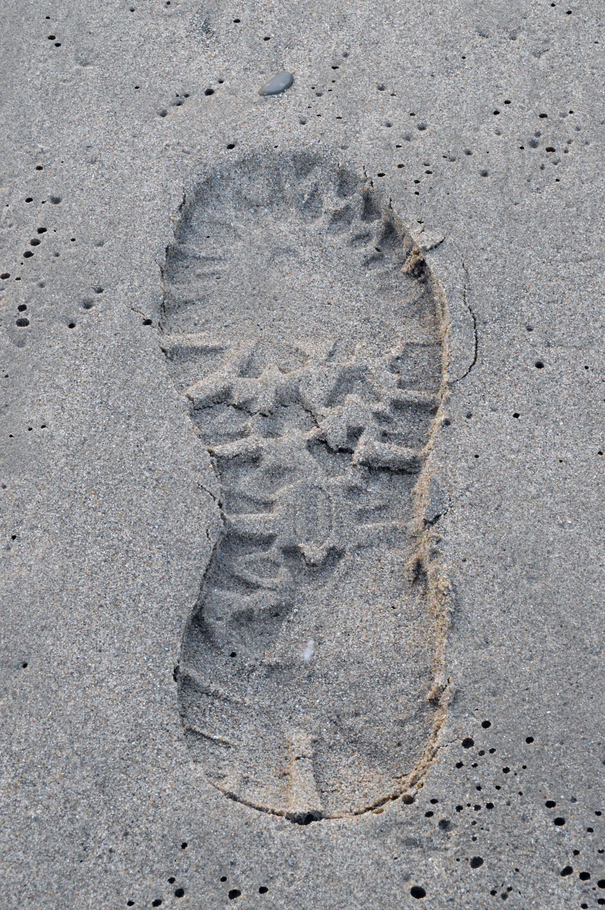 Voetafruk in het zand